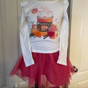 Two piece pumpkin spice top and skirt set.